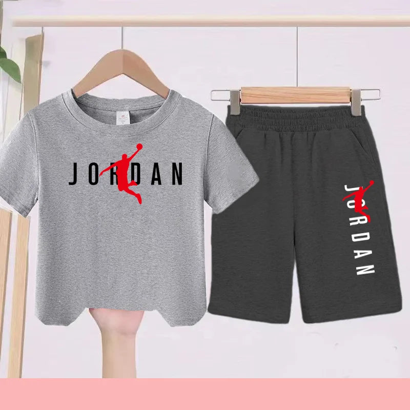 The Children's Summer Black and White One-piece Dress and Shorts Set Is Suitable for Those Aged 3 To12with Letter Patterns on It