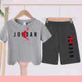 The Children's Summer Black and White One-piece Dress and Shorts Set Is Suitable for Those Aged 3 To12with Letter Patterns on It