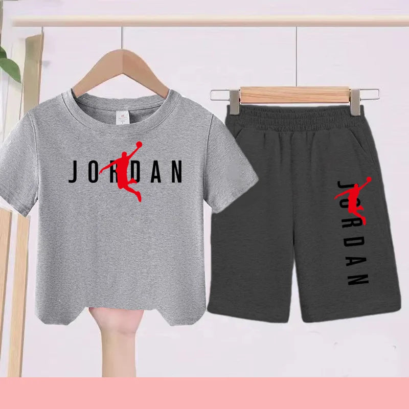 The Children's Summer Black and White One-piece Dress and Shorts Set Is Suitable for Those Aged 3 To12with Letter Patterns on It